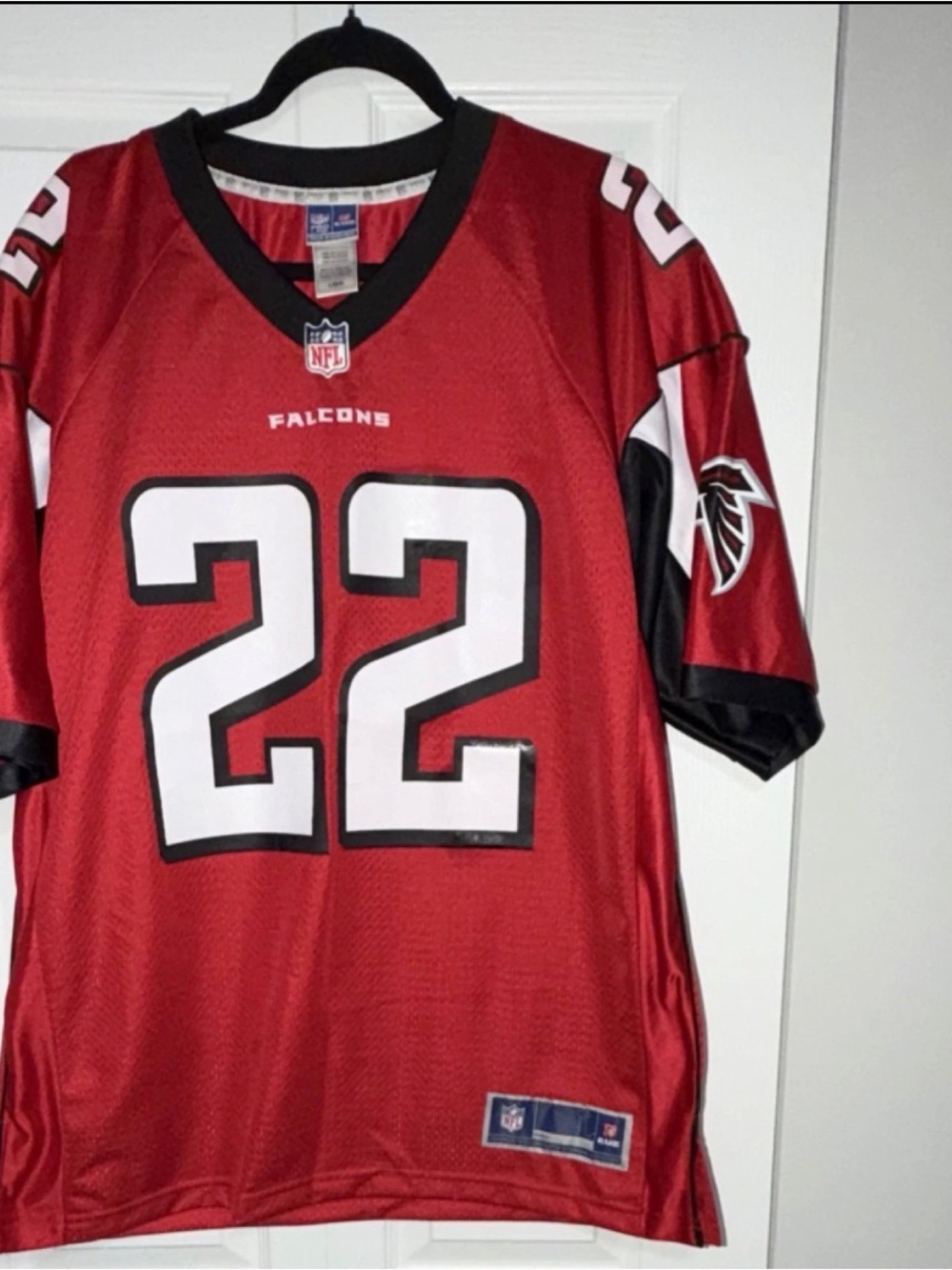 NFL Red and Black V‑Neck Pro Line Football Jersey Collar Detail